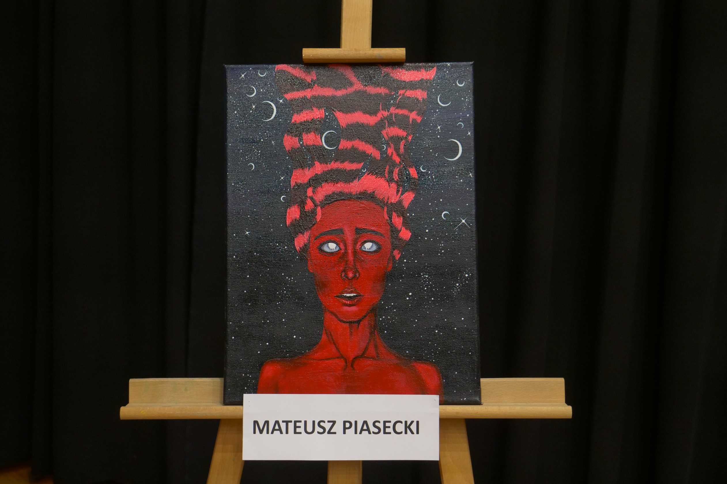 obraz wernisażu malarskiego "Podróże wyobraźni" uczniów ZSOiT w Wojkowicach w Miejskim Ośrodku Kultury w Wojkowicach